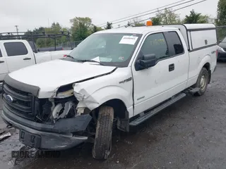 2013 Ford F-150 XL with VIN 1FTFX1ET8DKE95332, listed as a IAAI auction lot 40480905 with 243,758 mi miles and . Bid and sale history available at DreamBid. Image 2.