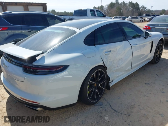 2018 Porsche Panamera 4 E-Hybrid z VIN WP0AE2A73JL129993, wystawiony jako IAAI lot #41602216 z przebiegiem 53 426 mil mil oraz . Historia ofert i sprzedaży dostępna na DreamBid. Obrazek 4.