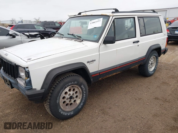 1996 Jeep Cherokee Sport with VIN 1J4FJ67S4TL224743, listed as a IAAI auction lot 42083533 with 253,847 mi miles. Bid and sale history available at carsss.com. Image 2.