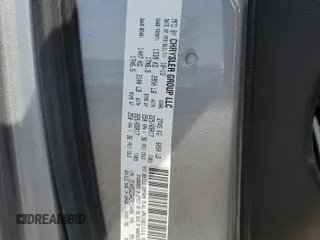 2014 Dodge Grand Caravan SXT with VIN 2C4RDGCG4ER114464, listed as a Copart auction lot 52480965 with 125,212 mi miles and Salvage Title. Bid and sale history available at DreamBid. Image 13.