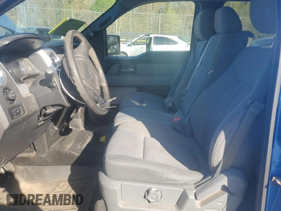 2013 Ford F-150 XL with VIN 1FTFW1EF3DFA87410, listed as a Copart auction lot 53025645 with 219,758 mi miles and Salvage Title. Bid and sale history available at DreamBid. Image 7.