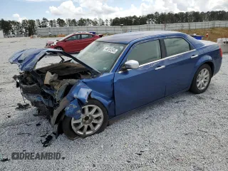 2009 Chrysler 300 LX with VIN 2C3KA43D29H581073, listed as a Copart auction lot 48702345 with 142,917 mi miles and Salvage Title. Bid and sale history available at carsss.com. Image 1.