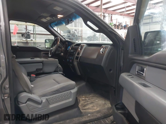 2011 Ford F-150 XLT with VIN 1FTFW1ET4BFB50467, listed as a IAAI auction lot 41608114 with 201,858 mi miles. Bid and sale history available at carsss.com. Image 5.
