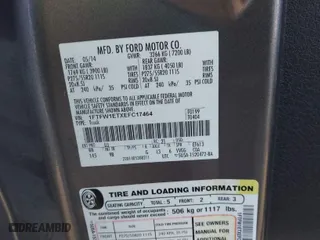 2014 Ford F-150 XL with VIN 1FTFW1ETXEFC17464, listed as a IAAI auction lot 41014879 with 150,129 mi miles. Bid and sale history available at carsss.com. Image 9.