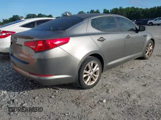 2013 Kia Optima EX with VIN 5XXGN4A73DG091000, listed as a IAAI auction lot 42555576 with 190,848 mi miles and . Bid and sale history available at DreamBid. Image 4.