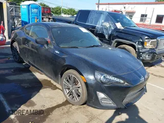 2015 Scion FR-S z VIN JF1ZNAA18F8705683, wystawiony jako IAAI lot #42178113 z przebiegiem 124 775 mil mil oraz . Historia ofert i sprzedaży dostępna na DreamBid. Obrazek 1.