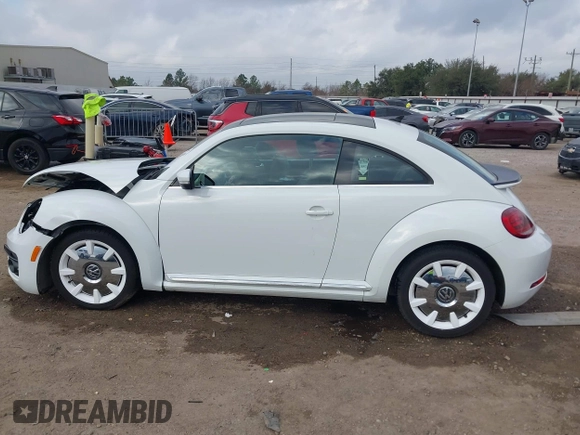 2019 Volkswagen Beetle S with VIN 3VWFD7AT2KM701622, listed as a IAAI auction lot 41520300 with Not provided miles and . Bid and sale history available at DreamBid. Image 15.