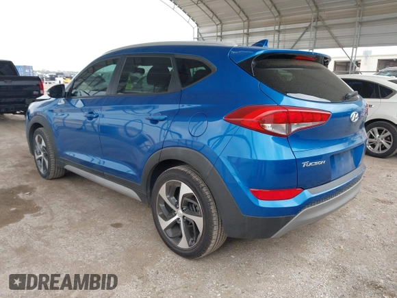 2018 Hyundai Tucson Sport with VIN KM8J33AL0JU803368, listed as a IAAI auction lot 41937235 with 64,163 mi miles and . Bid and sale history available at DreamBid. Image 3.