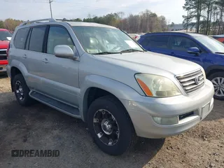 2004 Lexus GX 470 with VIN JTJBT20X340042612, listed as a IAAI auction lot 41840660 with 595,017 mi miles. Bid and sale history available at carsss.com. Image 1.