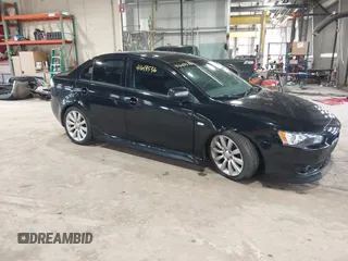 2011 Mitsubishi Lancer GTS with VIN JA32U8FW7BU034390, listed as a IAAI auction lot 41643536 with 130,319 mi miles and . Bid and sale history available at carsss.com. Image 6.