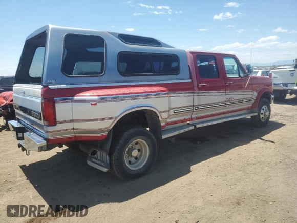 1994 Ford F-350 with VIN 1FTJW36K7REA33204, listed as a Copart auction lot 60685305 with 131,425 mi miles and Clean title. Bid and sale history available at DreamBid. Image 3.