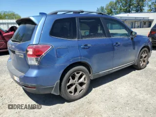 2017 Subaru Forester Touring with VIN JF2SJAWC2HH429099, listed as a Copart auction lot 64671135 with 104,709 mi miles and Salvage title. Bid and sale history available at DreamBid. Image 3.