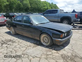 1989 BMW 5 Series with VIN WBAHD1314KBF08237, listed as a Copart auction lot 58951325 with 255,984 mi miles and Clean title. Bid and sale history available at DreamBid. Image 4.