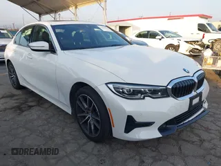 2022 BMW 3 Series 330i with VIN 3MW5R1J04N8C56510, listed as a IAAI auction lot 41458542 with 62,022 mi miles. Bid and sale history available at carsss.com. Image 1.
