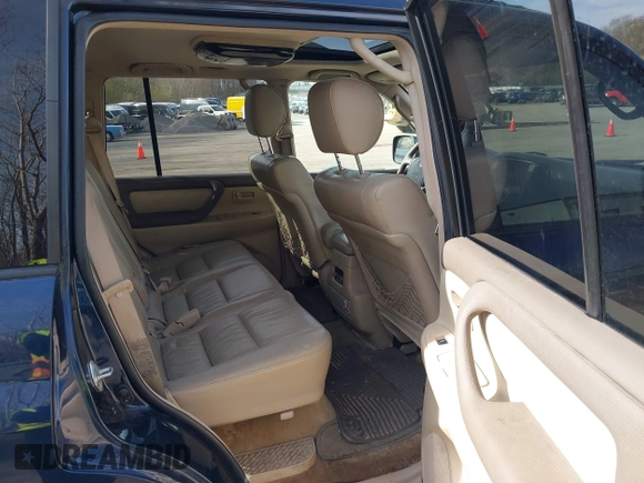 2004 Toyota Land Cruiser with VIN JTEHT05J942054673, listed as a IAAI auction lot 42112791 with 206,784 mi miles. Bid and sale history available at carsss.com. Image 8.