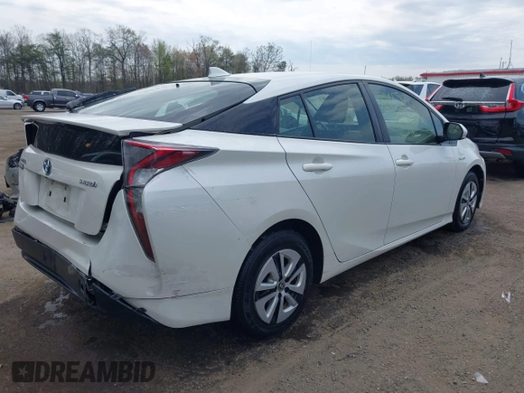 2017 Toyota Prius Two with VIN JTDKARFU1H3533778, listed as a IAAI auction lot 41958787 with 186,745 mi miles and . Bid and sale history available at DreamBid. Image 4.