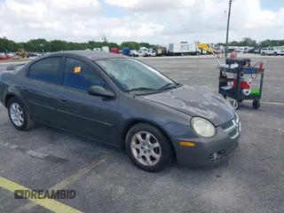2003 Dodge Neon SXT z VIN 1B3ES56C43D247003, wystawiony jako IAAI lot #42111917 z przebiegiem 115 107 mil mil oraz . Historia ofert i sprzedaży dostępna na DreamBid. Obrazek 1.