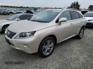2015 Lexus RX 450h with VIN 2T2BC1BA0FC001199, listed as a Copart auction lot 44721265 with 136,219 mi miles and Salvage Title. Bid and sale history available at DreamBid. Image 1.