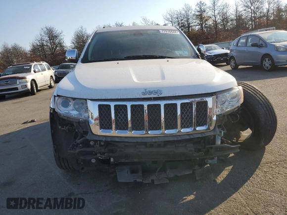 2013 Jeep Grand Cherokee Overland with VIN 1C4RJFCG8DC639408, listed as a Copart auction lot 77910444 with 89,623 mi miles and Salvage Title. Bid and sale history available at carsss.com. Image 5.
