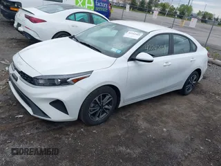 2023 Kia Forte LXS z VIN 3KPF24AD9PE657457, wystawiony jako IAAI lot #42242569 z przebiegiem 11 250 mil mil oraz . Historia ofert i sprzedaży dostępna na DreamBid. Obrazek 2.