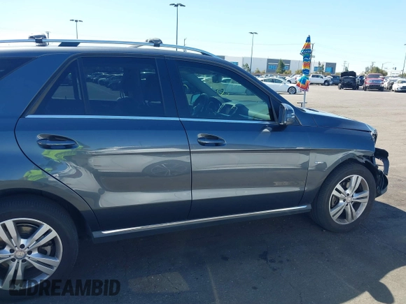 2012 Mercedes-Benz M 350 with VIN 4JGDA5HB4CA036981, listed as a IAAI auction lot 41831212 with 97,387 mi miles and . Bid and sale history available at DreamBid. Image 13.