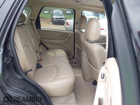 2005 Mazda Tribute S with VIN 4F2CZ96185KM16560, listed as a IAAI auction lot 42065748 with 84,584 mi miles and . Bid and sale history available at carsss.com. Image 8.