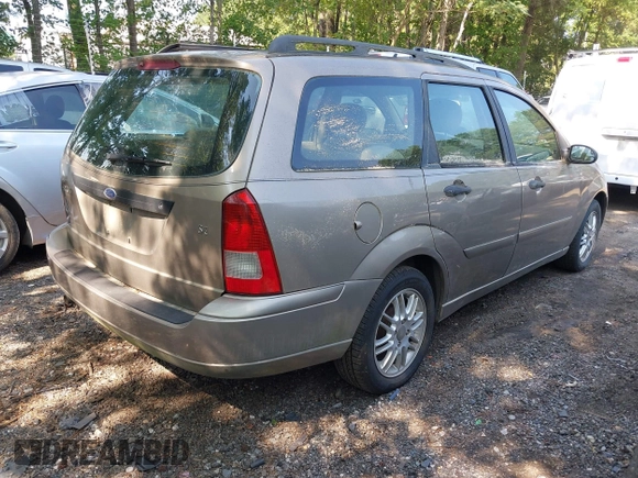 2004 Ford Focus SE z VIN 1FAFP36324W186481, wystawiony jako IAAI lot #42654016 z przebiegiem 168 331 mil mil oraz . Historia ofert i sprzedaży dostępna na DreamBid. Obrazek 4.