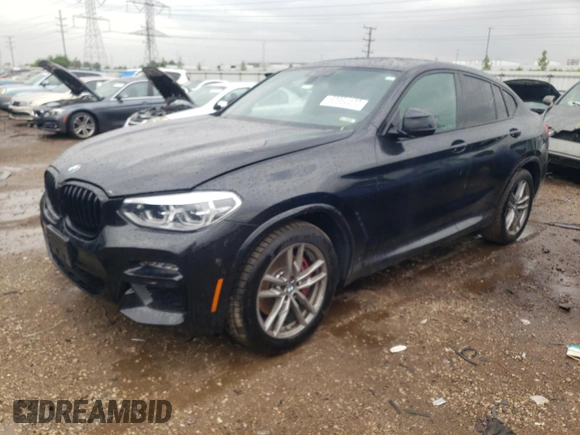 2021 BMW X4 M40i with VIN 5UX2V5C00M9H95699, listed as a Copart auction lot 63564433 with 33,500 mi miles and Salvage title. Bid and sale history available at DreamBid. Image 1.