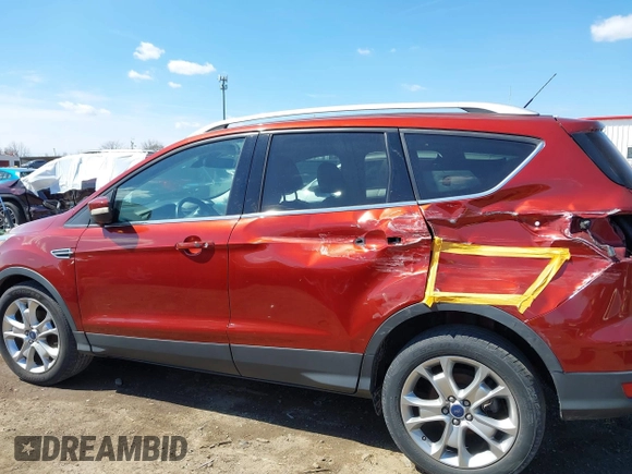 2016 Ford Escape Titanium with VIN 1FMCU0JX6GUC37684, listed as a IAAI auction lot 41829191 with 88,032 mi miles. Bid and sale history available at carsss.com. Image 14.