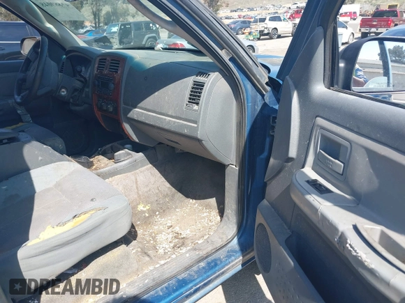 2005 Dodge Dakota SLT with VIN 1D7HE42N85S194847, listed as a IAAI auction lot 41880048 with 289,575 mi miles and . Bid and sale history available at DreamBid. Image 5.