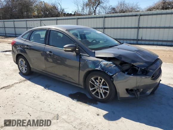 2015 Ford Focus SE с VIN 1FADP3F22FL299799, выставлен на аукционе Copart как лот 42420665 с пробегом 141 349 миль миль и Списание • Salvage title. История ставок и продаж доступна на DreamBid. Изображение 4.