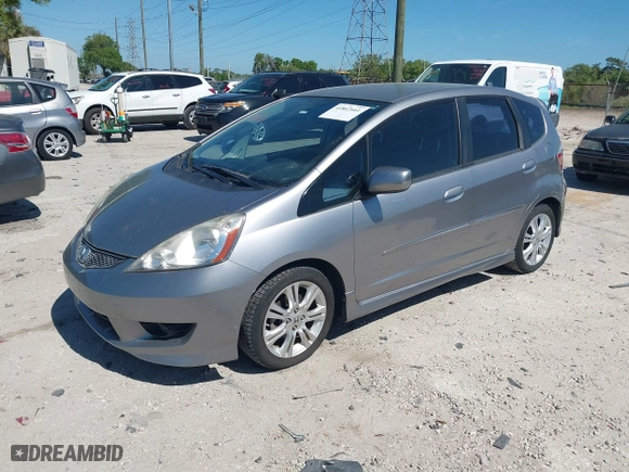 2009 Honda Fit Sport w/Navi with VIN JHMGE886X9S055014, listed as a IAAI auction lot 41847661 with 54,234 mi miles. Bid and sale history available at carsss.com. Image 17.