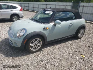2012 MINI Cooper Convertible with VIN WMWZN3C5XCT134595, listed as a Copart auction lot 52424085 with NaN miles and Clean Title. Bid and sale history available at carsss.com. Image 1.