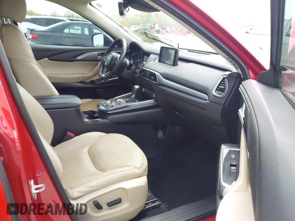 2016 Mazda CX-9 Touring with VIN JM3TCACY4G0112961, listed as a IAAI auction lot 42094718 with 114,679 mi miles and . Bid and sale history available at DreamBid. Image 5.