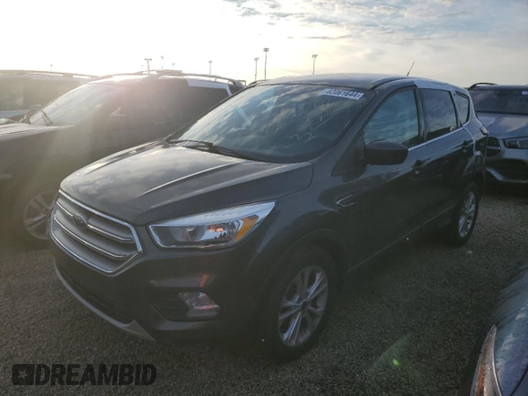 2017 Ford Escape SE z VIN 1FMCU0GDXHUE91333, wystawiony jako Copart lot #82061644 z przebiegiem Nie podano mil oraz Nie do naprawy • Non repairable. Historia ofert i sprzedaży dostępna na DreamBid. Obrazek 1.