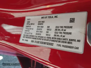 2021 Tesla Model 3 Long Range with VIN 5YJ3E1EBXMF928002, listed as a IAAI auction lot 42003092 with 25,867 mi miles. Bid and sale history available at carsss.com. Image 8.