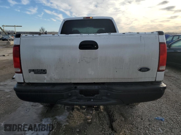 2000 Ford F-350 XL with VIN 1FTSW31F6YEC96409, listed as a Copart auction lot 42994345 with 334,310 mi miles and Salvage title. Bid and sale history available at DreamBid. Image 6.