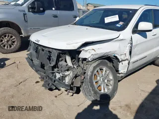 2018 Jeep Grand Cherokee Laredo E with VIN 1C4RJEAG2JC428990, listed as a IAAI auction lot 41218996 with 123,758 mi miles. Bid and sale history available at carsss.com. Image 6.