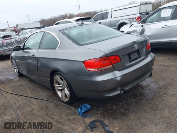 2007 BMW 3 Series 335i with VIN WBAWB73527P023413, listed as a IAAI auction lot 40961381 with 240,988 mi miles and . Bid and sale history available at DreamBid. Image 3.