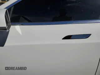 2014 Tesla Model S 60 z VIN 5YJSA1H19EFP37392, wystawiony jako Copart lot #57347625 z przebiegiem Nie podano mil oraz Szkoda całkowita • Salvage title. Historia ofert i sprzedaży dostępna na DreamBid. Obrazek 7.