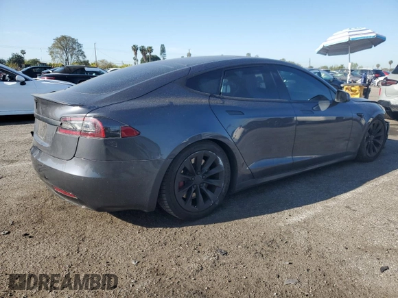 2017 Tesla Model S 100D с VIN 5YJSA1E23HF199497, выставлен на аукционе Copart как лот 51302475 с пробегом 61 993 миль миль и Списание • Salvage title. История ставок и продаж доступна на DreamBid. Изображение 3.
