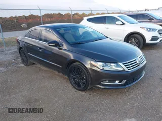2015 Volkswagen CC Lux with VIN WVWRP7AN9FE819154, listed as a IAAI auction lot 41669832 with 151,142 mi miles. Bid and sale history available at carsss.com. Image 1.