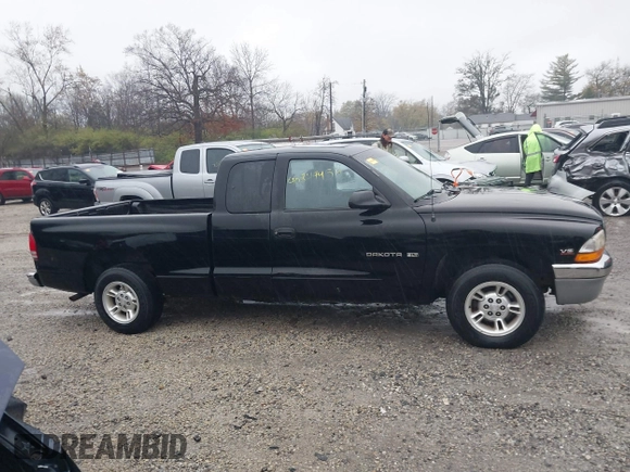 2000 Dodge Dakota with VIN 1B7GL22X6YS703226, listed as a IAAI auction lot 40849454 with 105,990 mi miles. Bid and sale history available at carsss.com. Image 13.