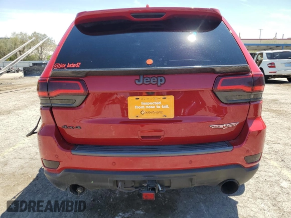 2019 Jeep Grand Cherokee Trailhawk with VIN 1C4RJFLT4KC787940, listed as a Copart auction lot 60883895 with 77,160 mi miles and Salvage title. Bid and sale history available at DreamBid. Image 6.