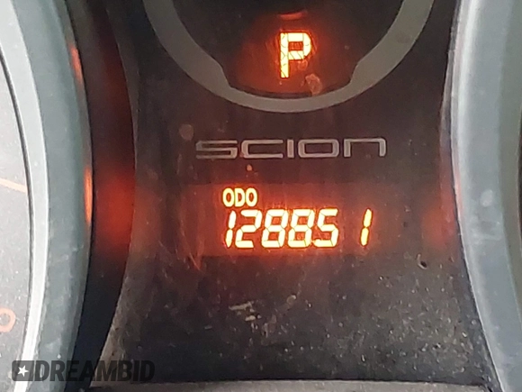 2015 Scion tC with VIN JTKJF5C7XFJ001662, listed as a IAAI auction lot 41843123 with 128,851 mi miles. Bid and sale history available at carsss.com. Image 15.