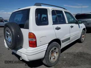 2003 Suzuki Vitara z VIN 2S3TE52V936103533, wystawiony jako Copart lot #55297135 z przebiegiem 122 230 mil mil oraz Szkody całkowita. Historia ofert i sprzedaży dostępna na DreamBid. Obrazek 3.