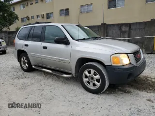 2005 GMC Envoy SLT with VIN 1GKDS13S352101385, listed as a Copart auction lot 89271025 with 165,670 mi miles and Salvage Title. Bid and sale history available at carsss.com. Image 4.