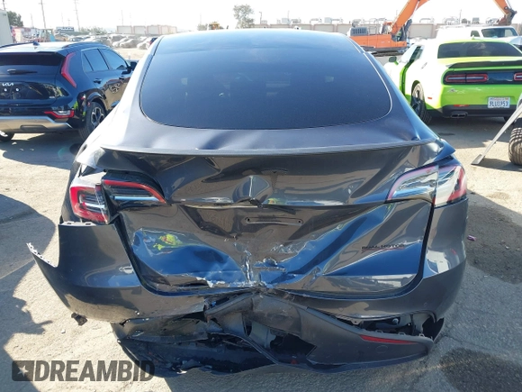 2022 Tesla Model Y Performance with VIN 7SAYGDEF7NF562895, listed as a IAAI auction lot 41692864 with 29,904 mi miles and . Bid and sale history available at DreamBid. Image 15.