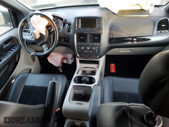 2017 Dodge Grand Caravan SXT with VIN 2C4RDGCG1HR750697, listed as a Copart auction lot 83490934 with 169,817 mi miles and Salvage Title. Bid and sale history available at DreamBid. Image 8.