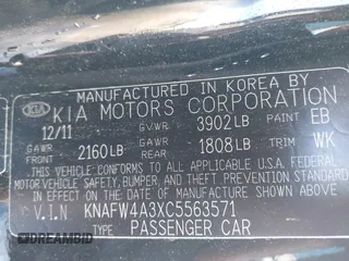 2012 Kia Forte SX with VIN KNAFW4A3XC5563571, listed as a IAAI auction lot 41590629 with 115,993 mi miles. Bid and sale history available at carsss.com. Image 9.